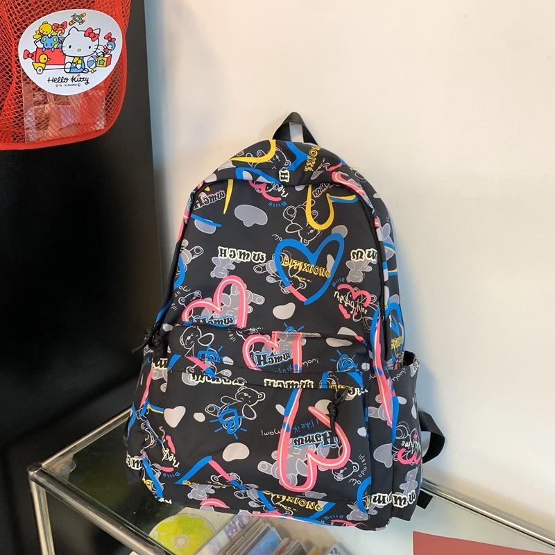 

Backpack 2025, trendy and fashionable graffiti backpack, large-capacity waterproof and wear-resistant schoolbag for junior high school students single package чорний