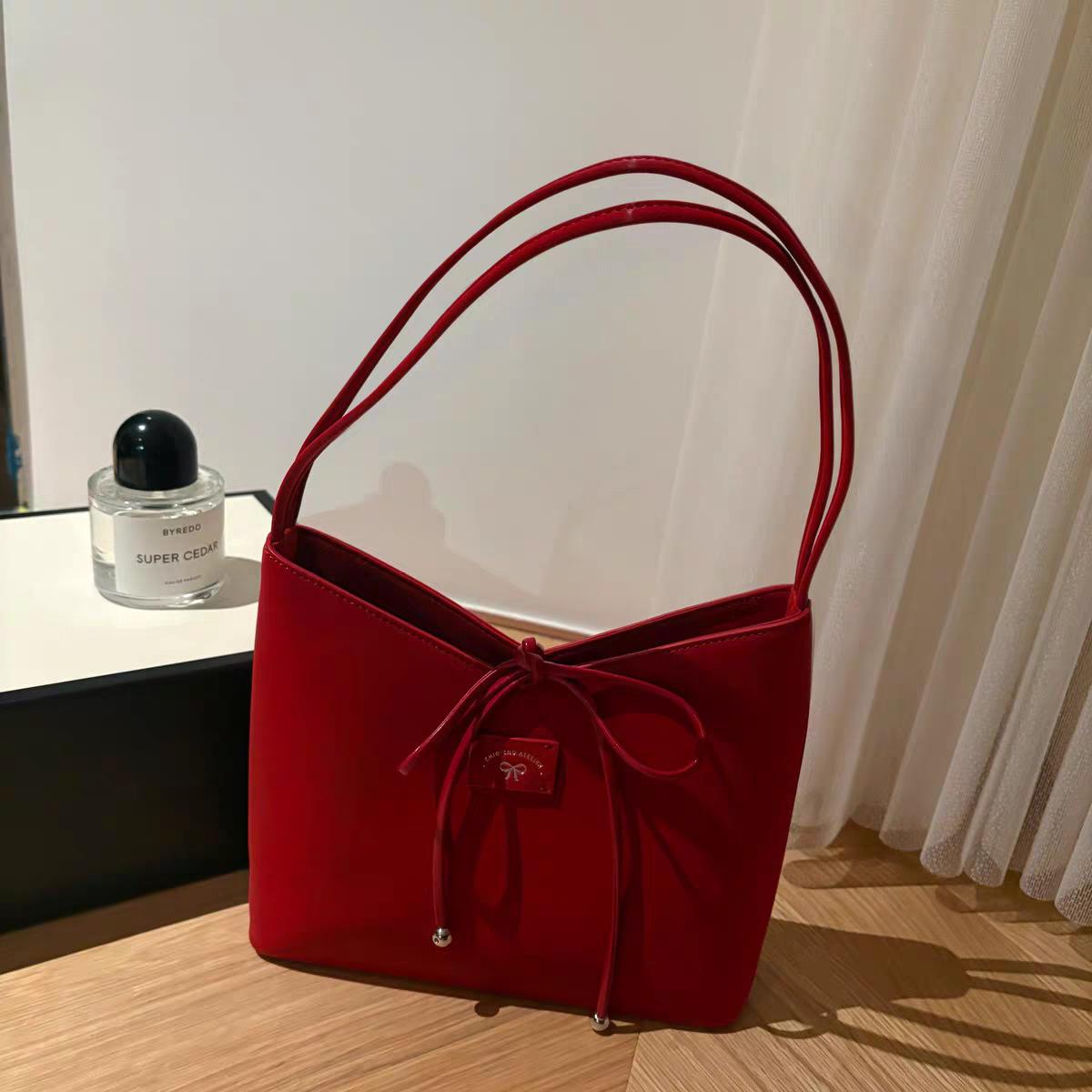

Nanfeng versatile trend berry red brown tote bag women s summer 2025 new retro red portable shoulder bag