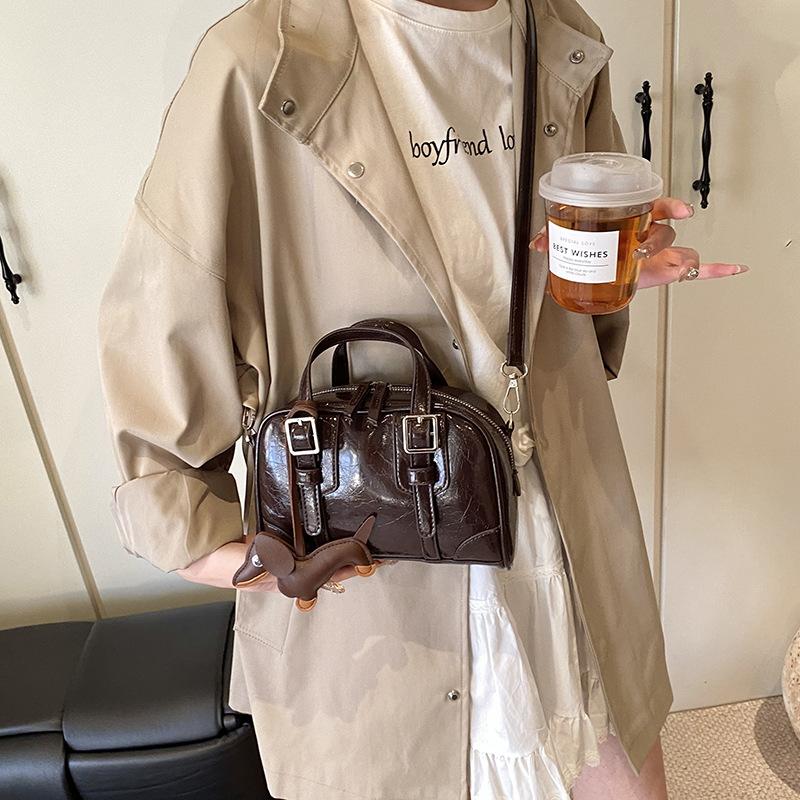 

Ретро иностранный стиль ниша масло воск кожа портативная подушка сумка универсальная текстура мессенджер женская сумка no pendant темно-коричневого