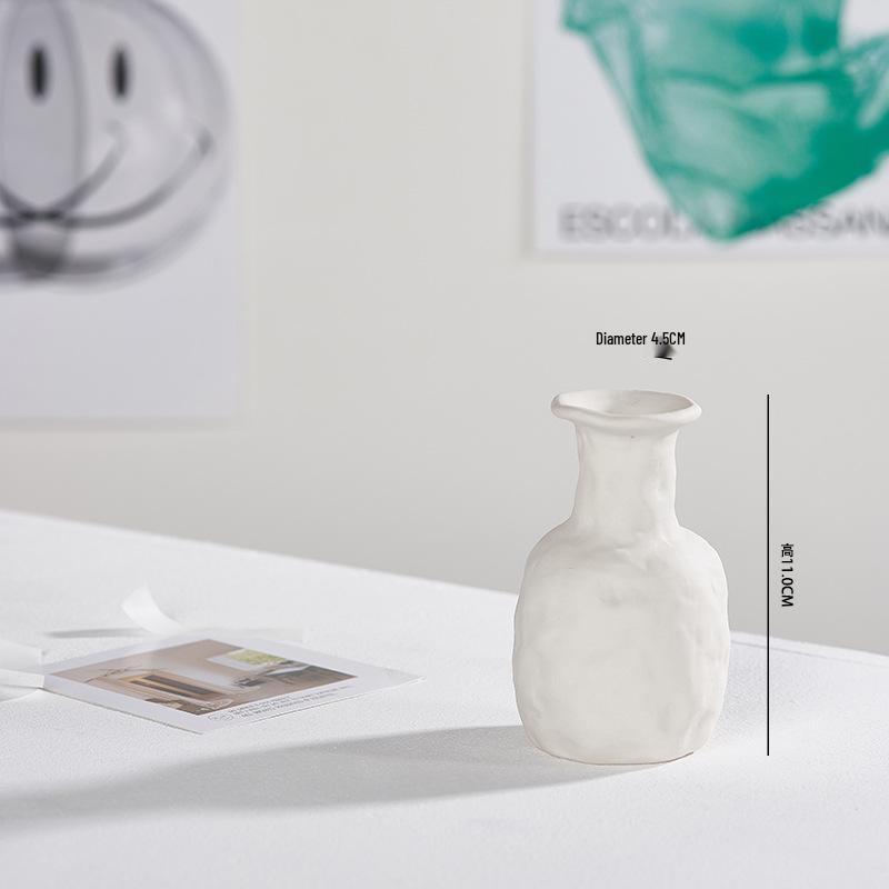 White Ceramic Vase with Dried Baby's Breath for Living Room or Dining Table Decoration