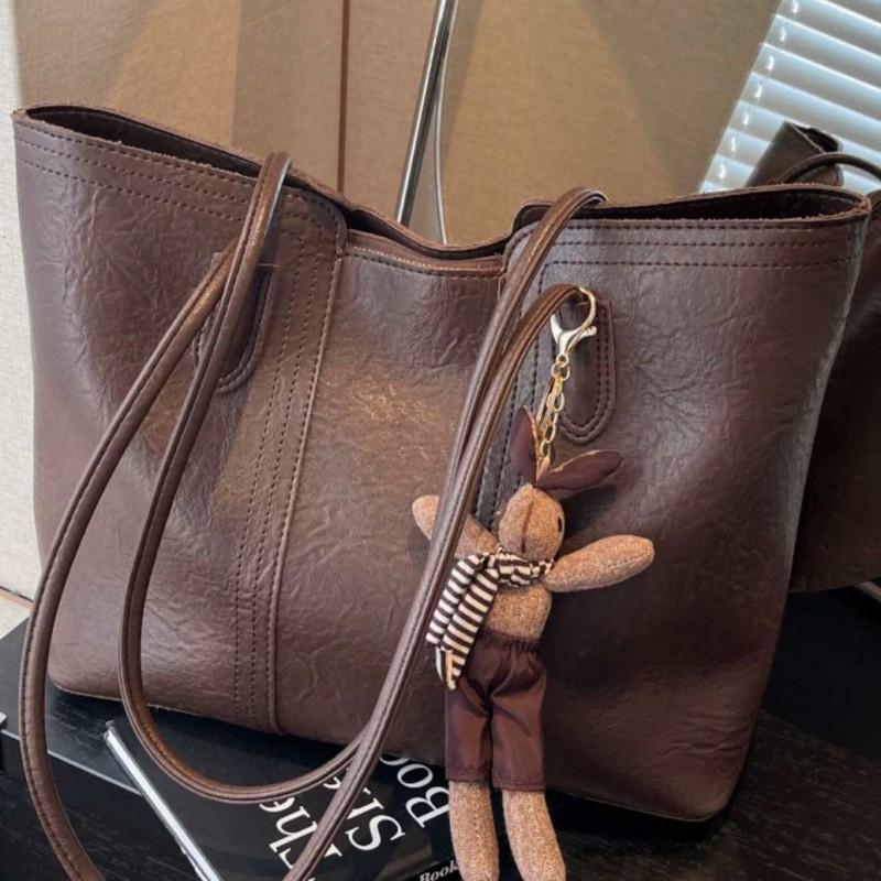 Hochwertige Retro-Tasche mit großem Fassungsvermögen, modische Damen-Umhängetasche für Pendler, beliebte Tragetasche