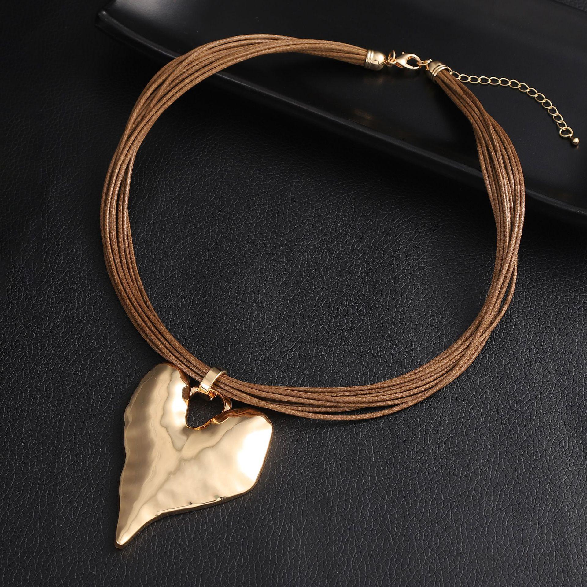 

Новая золотая трехмерная любовь кожаный шнурок кулон, неправильной формы сердце высококлассное женское универсальное ожерелье