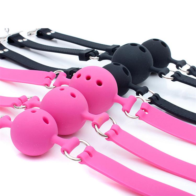 Icele Silicone Oral Sex Gag: Black, Soft Gel Ball with Hole In Various Sizes for Erotic Play.