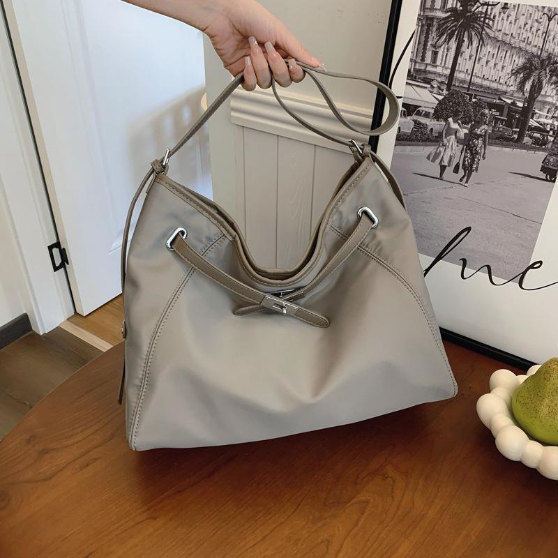 

New stylish and simple draw with lock casual Kaibaoli shoulder oblique span versatile women s bag серый