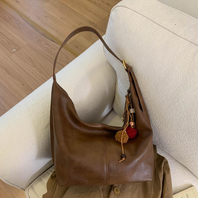 

Вместительная сумка для поездок на работу женская 2025 осень и зима новая нишевая ретро сумка через плечо простая текстурная сумка-мессенджер коричневый