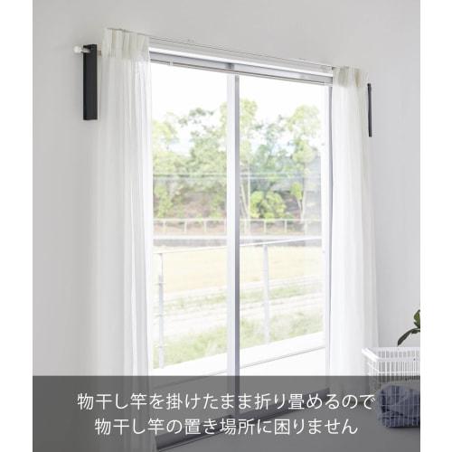 Yamazaki Tower Wall-Mounted Folding Clothes Drying Pole Holder (Set of 2), Compatible with Drywall, Includes Drywall Tweezers and Wood Screws, Black,