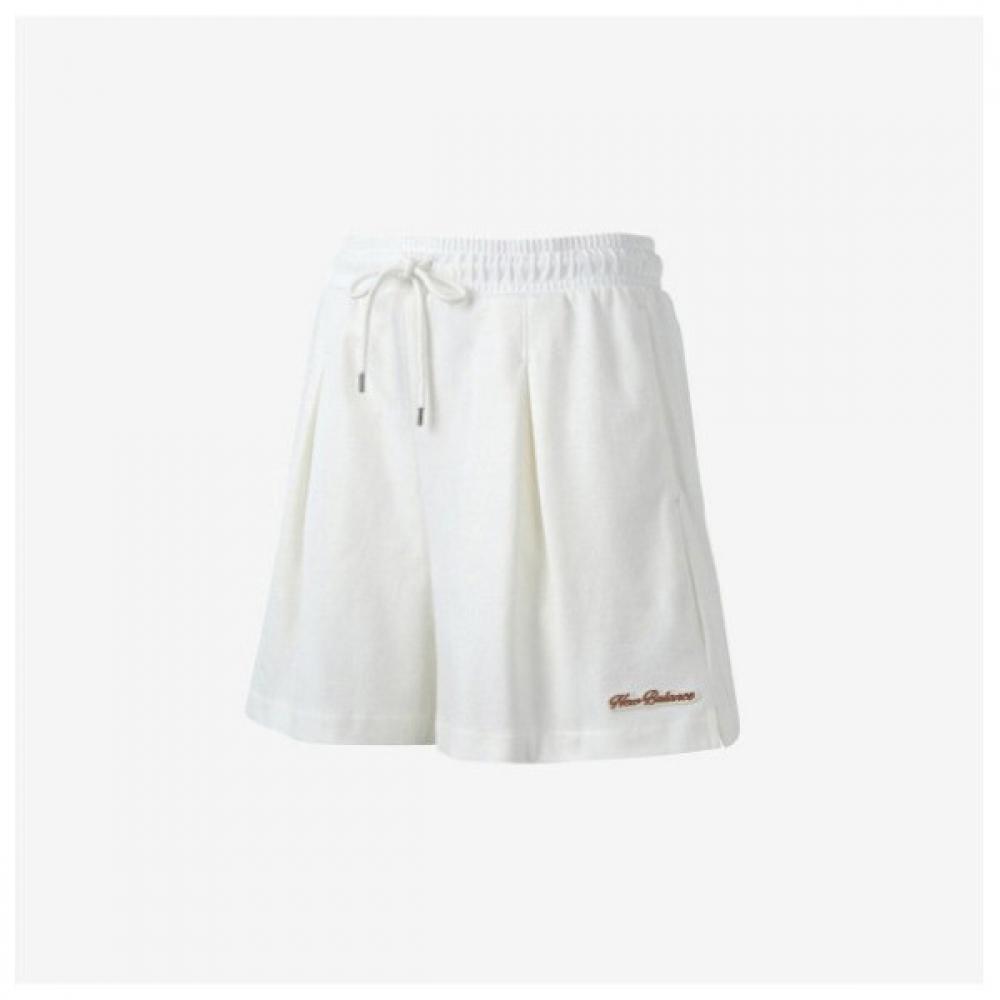 

New Balance Shorts Kqj Nbnvd2w512 64 Women Beige series/70