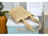 Handmade Hollow Woven Underarm Tote Bag: Fashionable Single Shoulder Beach & Commute Bag for Women