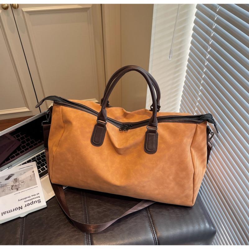 The Hand-held Travel Bag and The Crossbody Fitness Bag Exude A Sense of Sophistication and Fashion