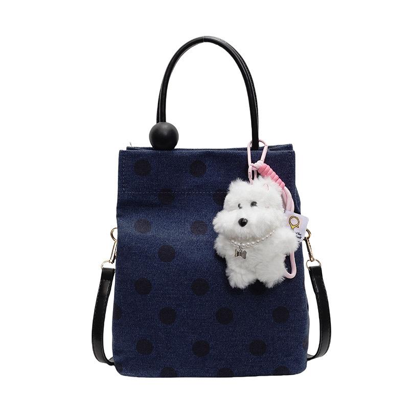 New product explosion Korean niche casual personality polka dot portable small bag versatile foreign style college style messenger bag women
