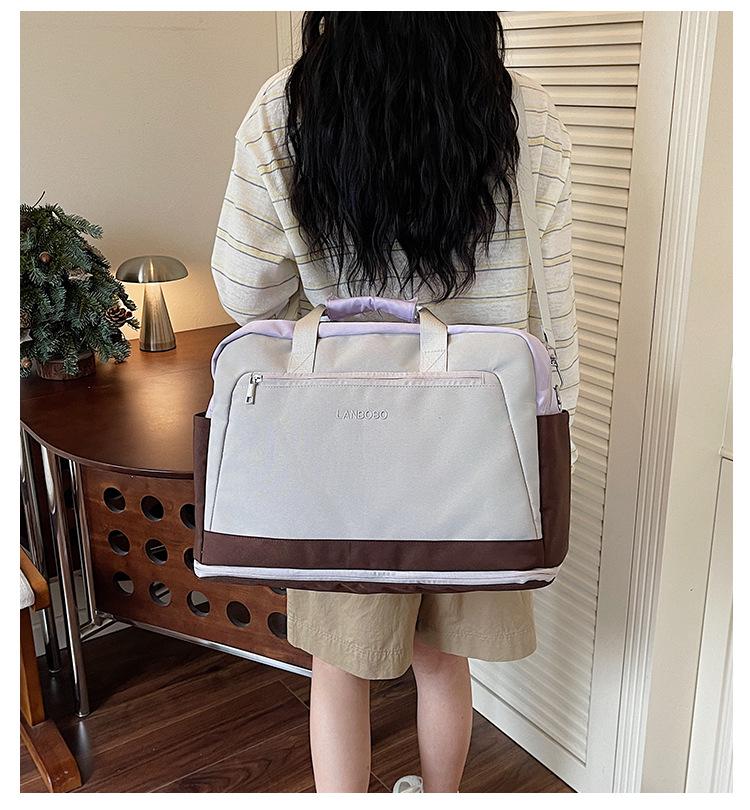 Large Capacity Casual Travel Bag: New Style Lightweight Handheld & Shoulder Luggage Storage for Couples