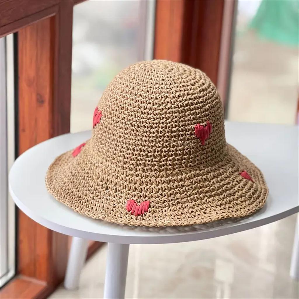 An Insta-style wavy edge large eaves straw fisherman hat women's summer braided love straw hat holiday beach breathable sunshade