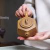 Hexagonal Sea View Yixing Zisha Teapot with Dragon Bone Gold Sand 