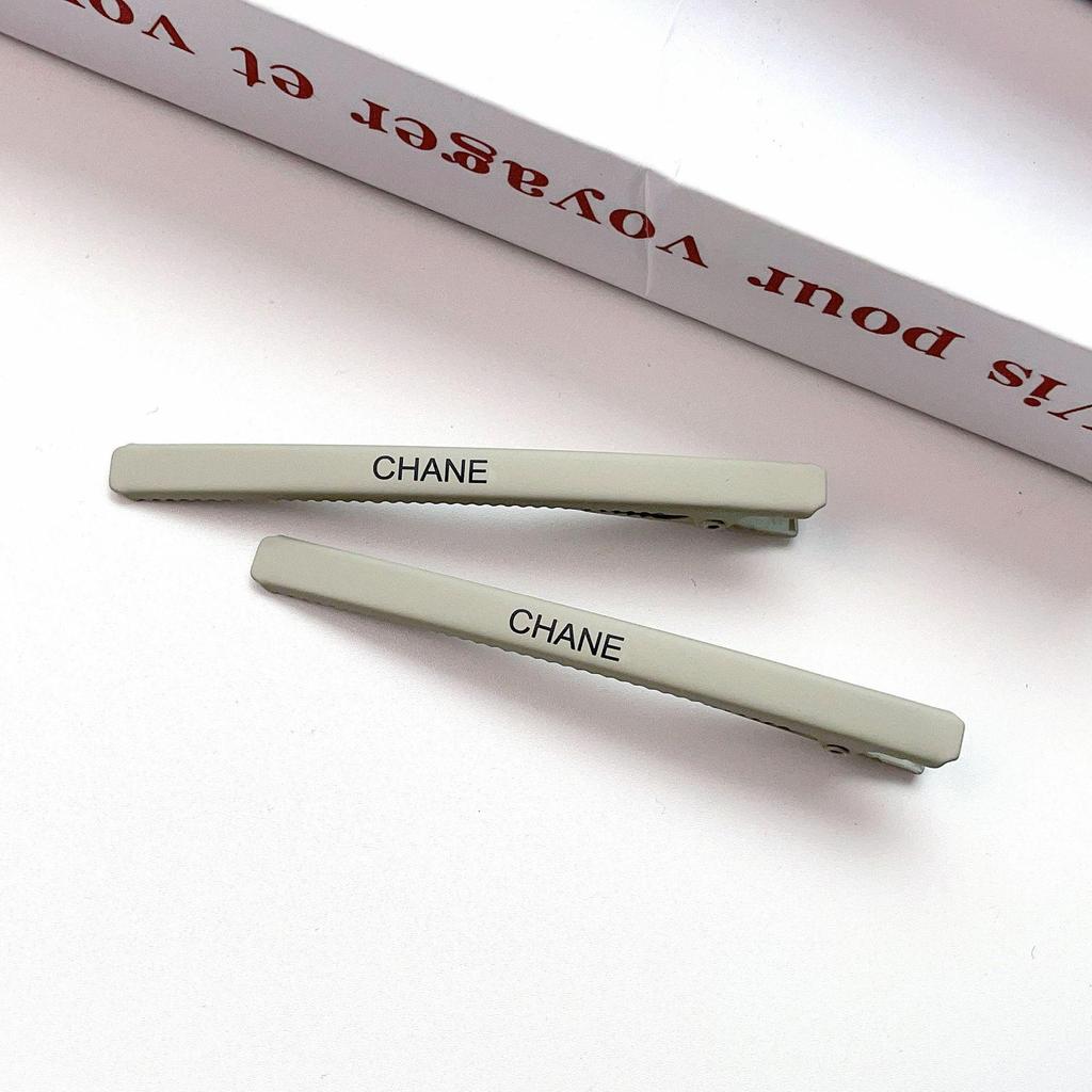 Xiaoxiang Brief Metall-Seitenclip: Hochwertiges Stirn- und Haaraccessoire