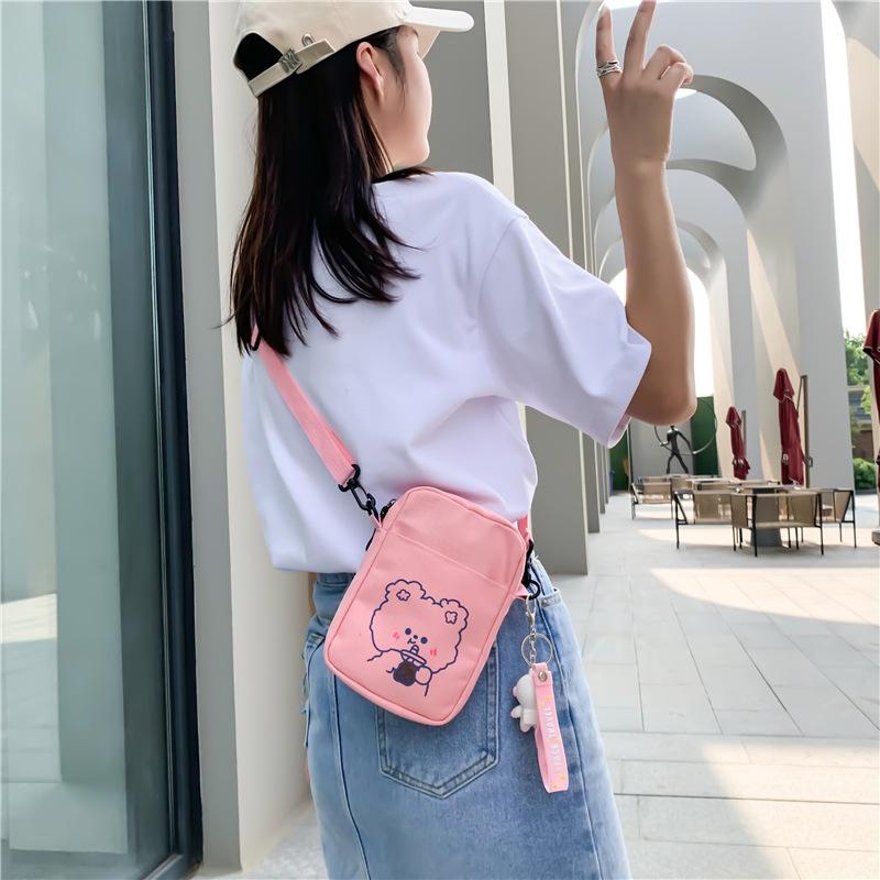Petit Sac bandoulière en toile pour femmes Dames Sac à bandoulière décontracté en tissu Porte-monnaie pour téléphone Sac à main imprimé dessin animé