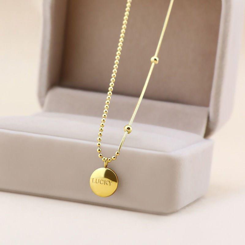 Niche Design Lucky Gold Bean Necklace with Round Bead Chain: European, American, and Korean Style with a Light Luxury Feel.