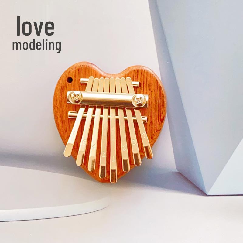 

Мини калимба на 8 нот - Компактный музыкальный инструмент и практичный подарок