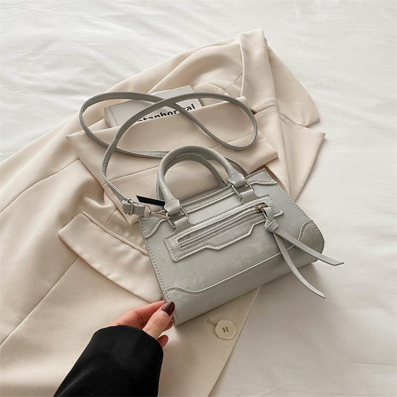

Fashion personalized zipper splicing commute 2025 new simple locomotive style casual crossbody shoulder portable small square bag серый