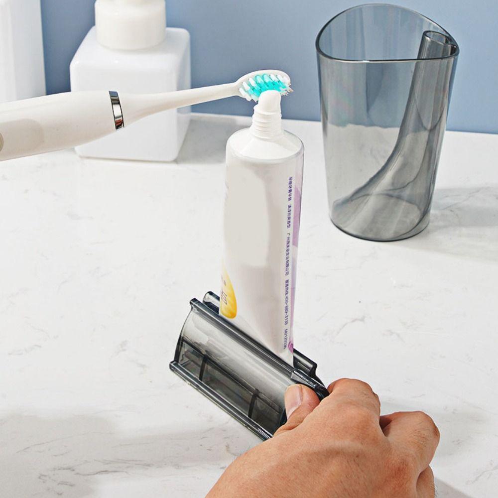 Seat Holder Toothpaste Rolling Tube Rotate Dispenser Portable Squeezer Household