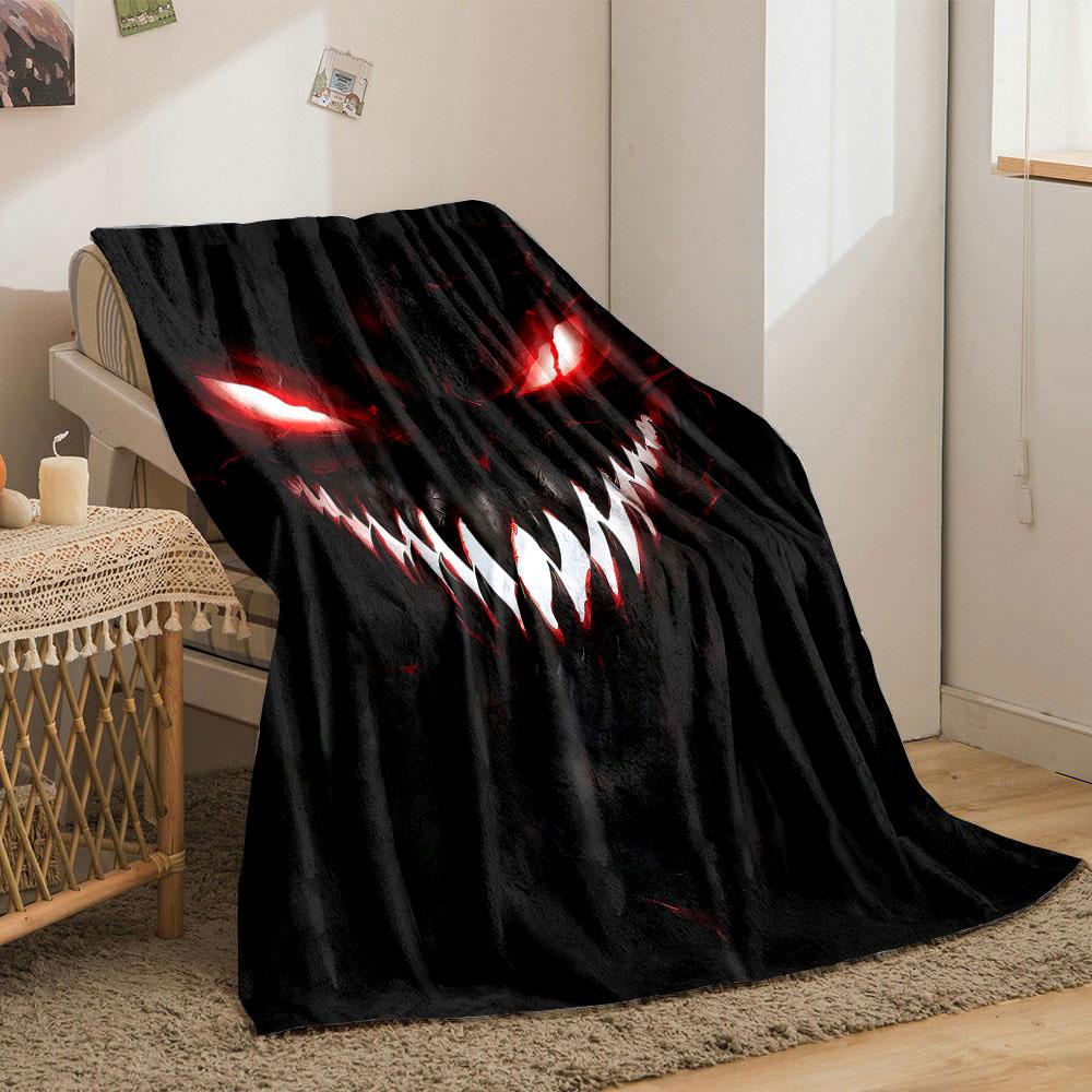 Sinister, glowing red eyes and sharp white teeth in a dark background. for all seasons blanket lunch break throw gift