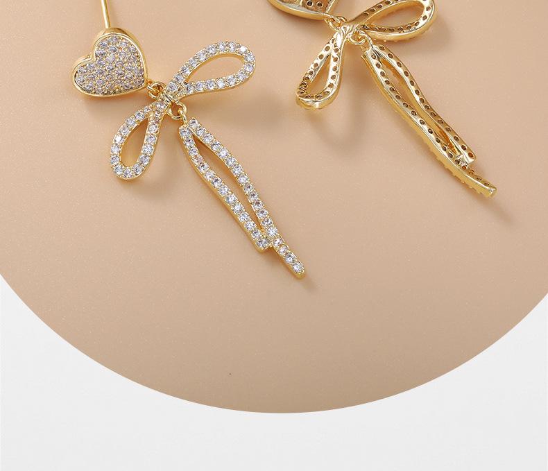 Brincos de Coração Pérola Brilhante com Laço: Estilo Coreano Feminino com Elegância de Alto Padrão e Personalidade