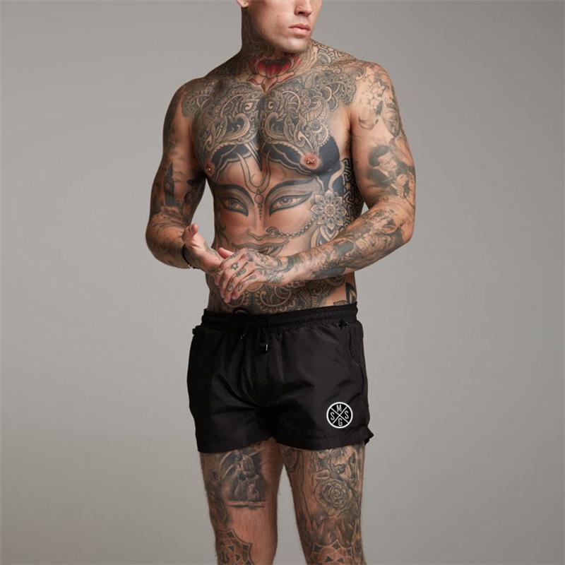 

Muscleguys Workout Street Wear Мужские свободные шорты для бега Беговые походы Короткие брюки для бега L чёрный