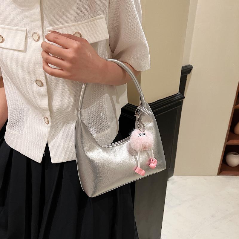 

Высококачественная модная универсальная сумка женская 2024 новый нишевый дизайн повседневная сумка через плечо однотонная сумка-багет подмышка 22*5*10 серебряный