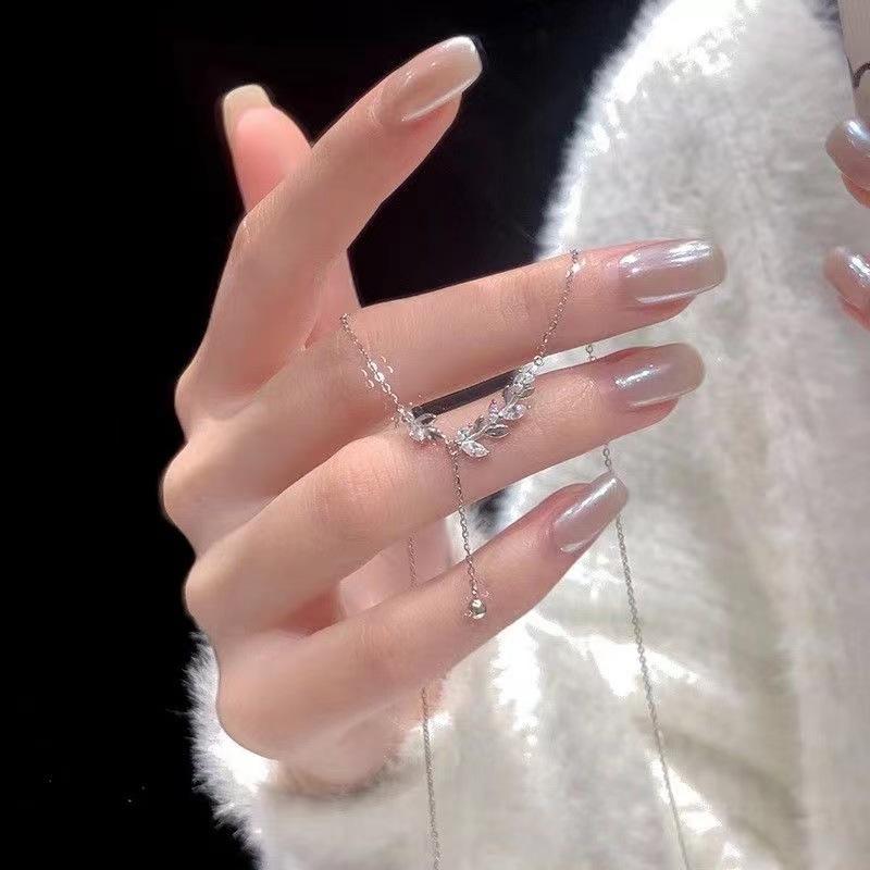 Collier de blé super brillant pour femme, design de niche doux d'été, chaîne de clavicule à pompon en forme de feuille de ping-an