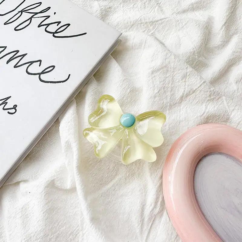 3D Niedlicher transparenter Blumenbogen-Fingerring-Griptok-Telefonhalter für iPhone-Stützbuchse Pocket Grip Tok-Ständerhalterung