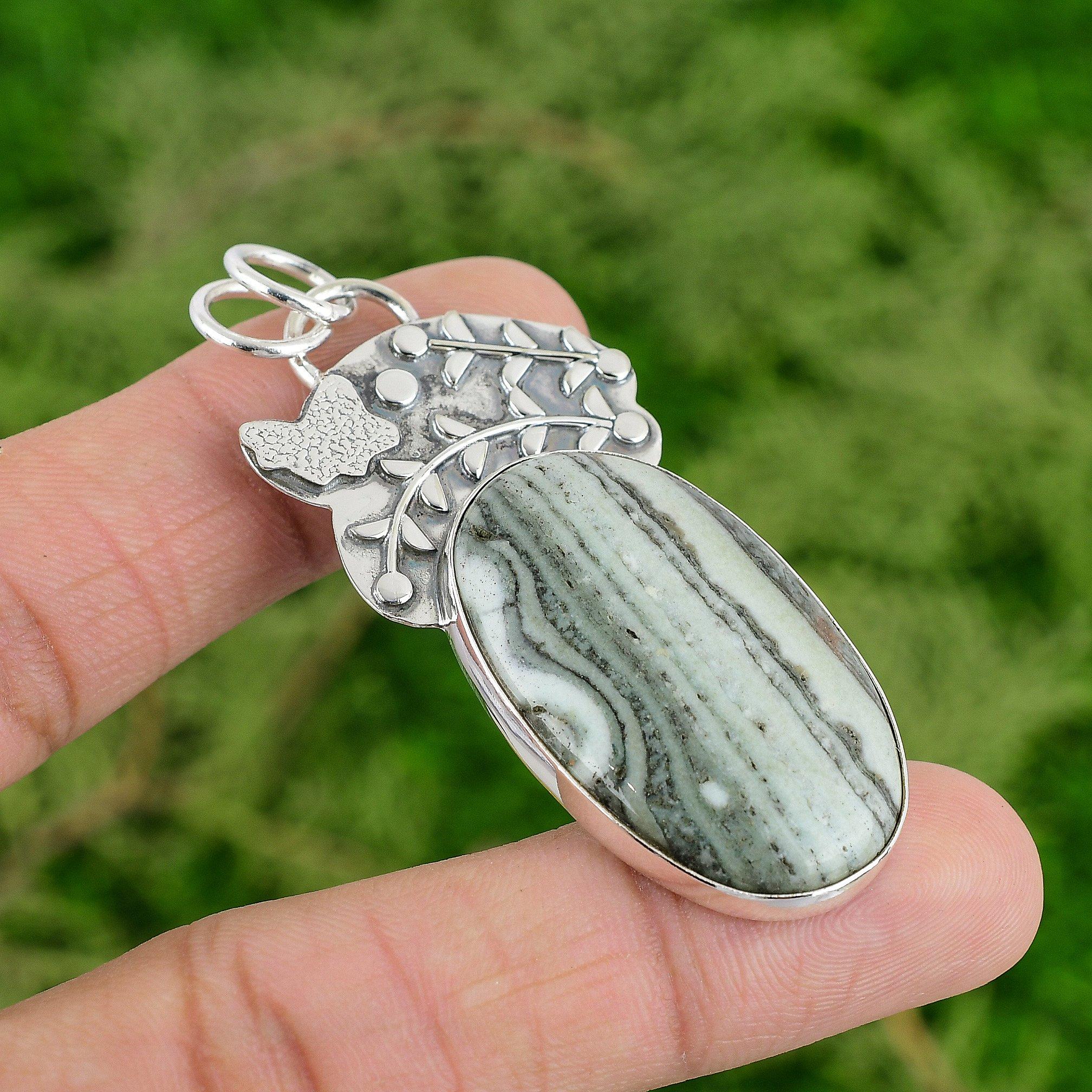 

Daughters Day Deal Oval Natural Blue Rhodochrosite Sterling Silver Bezel Pendant