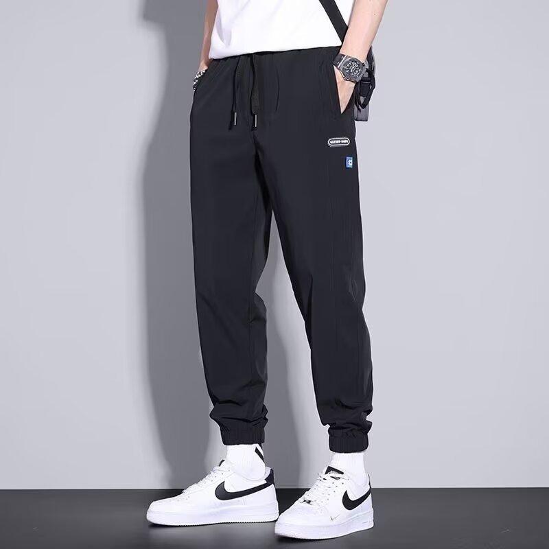Men's casual pants elastic, loose, simple and comfortable, young students slim-fitting small feet and trousers