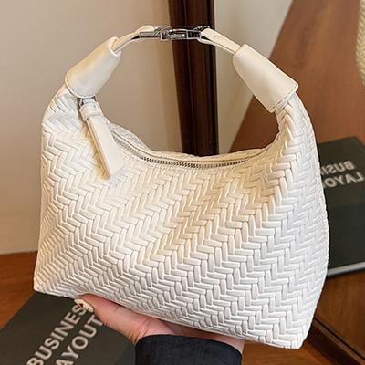 French Niche Woven Pattern Handbag Women's 2025 Spring and Summer Simple and Elegant Dumpling Bag Commuter Texture Messenger Bag
