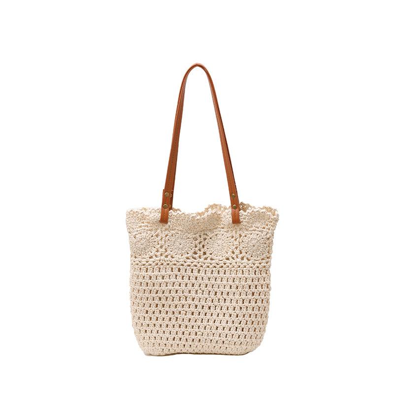 

Delicate hollow knitted pattern large capacity women s tote bag 25 new versatile small fresh women s shoulder armpit bag