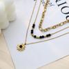 Women's Luxurious Layered Necklace with Black Bead and Sun Pendant – Versatile Three-Layer Design
