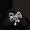 European and American light luxury bow bead pendant brooch new fashion accessories women's suit coat exquisite temperament pin