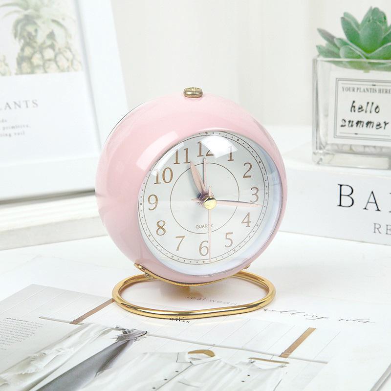 Silent Metal Alarm Clock with Night Light and Gold Stamped Spherical Face - Perfect for Students and Children.