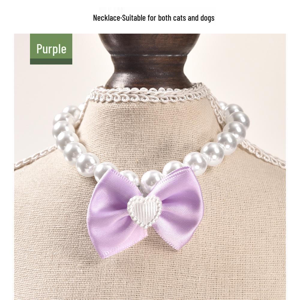 

Ювелирный ошейник для питомца: Универсальное жемчужное ожерелье с бантом для собак и кошек фиолетовый