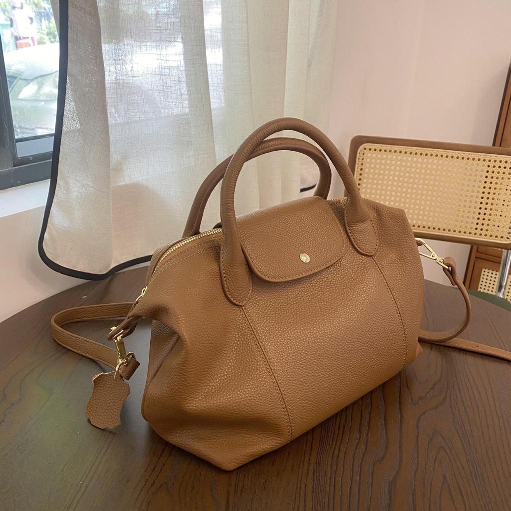 Japanese and Korean Soft Cowhide Handbag: Classic Women's Genuine Leather Dumpling Bag, Shoulder & Crossbody Style.