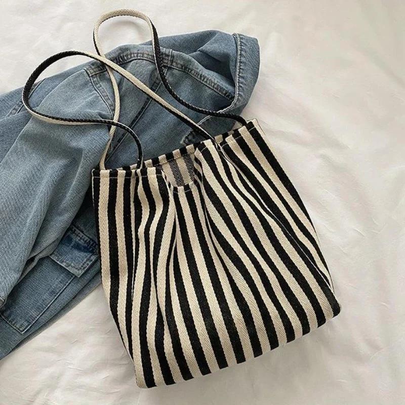 

Female Casual Multifunctional Travel Top-handle Handbag Large Capacity Canvas Women Shopper Tote Simple Striped Shoulder Bag2025 чорний