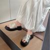 Stepping on shit~ thick-soled slippers women's 2025 summer wear French flat-bottomed one-word drag with skirt maternity beach slippers