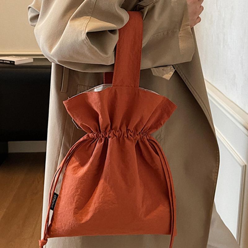 Korean version of girls bag large capacity ins style solid color personalized pleated canvas bag drawstring simple foreign style shoulder bag