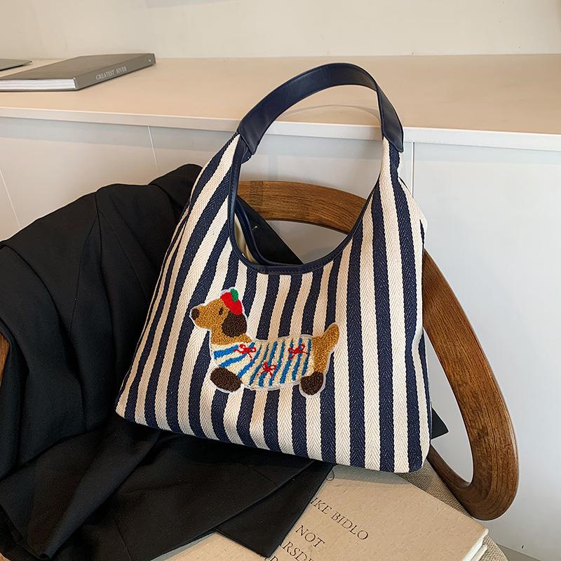 

2025 autumn new cute puppy pattern bag large capacity soft simple messenger shoulder bag commuter bag female