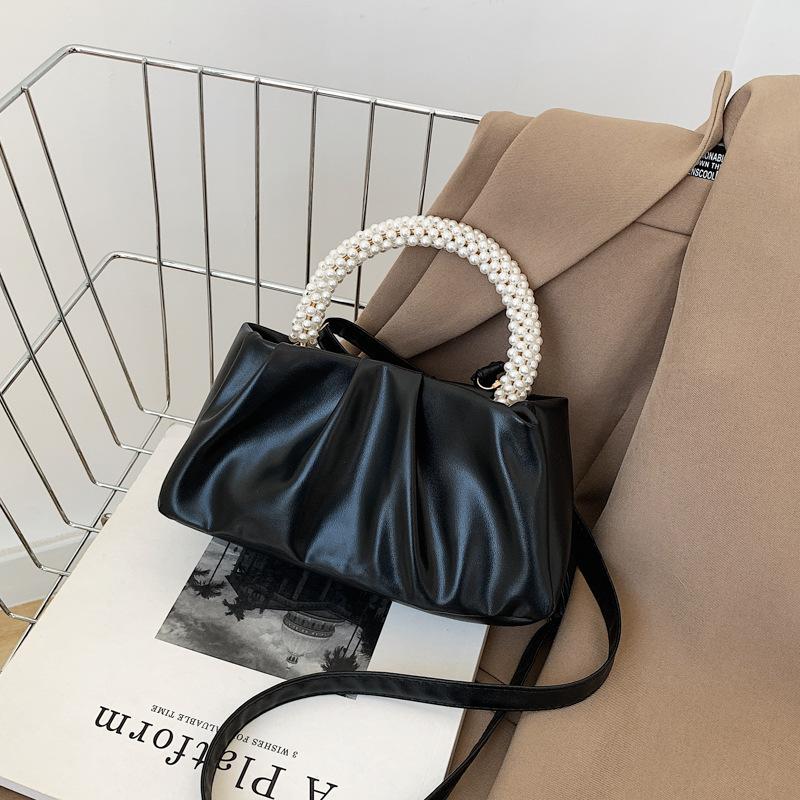 Solid color women's bag, summer new cloud bag, fashionable softfaced portable small bag, simple foreign style single shoulder oblique span bag