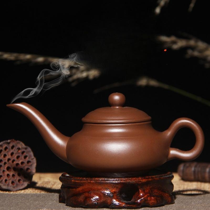 Purple sand teapot tea maker Zhu clay pot long mouth pot magic lamp pot Kung fu tea set small teapot hand grab pot