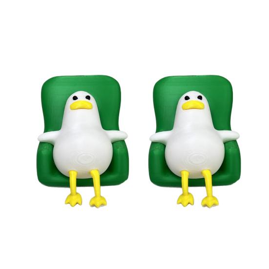 2Pcs 3D Printed Duck Relaxed Lying-Down Ducks Ornaments Cute on Green Sofa
