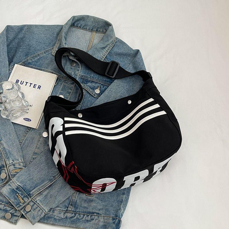 

Stripes Canvas Bag Women s 2025 New Arrival Work Clothing Oxford Cloth Sports Dumpling Bag Casual Easiest for Match Shoulder Messenger Bag Black