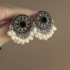 Retro ethnic style round hollow earrings Bohemian temperament elegant earrings niche fashion light luxury earrings women