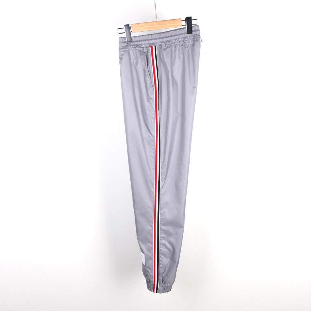

22SS Thom Browne Тренировочные брюки Ripstop с тремя полосками по бокам Серые MJQ070A03215055