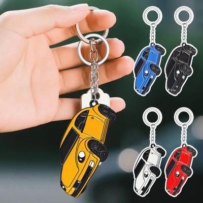 Schlüsselanhänger Anhänger Emaille-Färbung Klarer Körper Linien Käfer Auto Form Schlüsselanhänger mit Metallring
