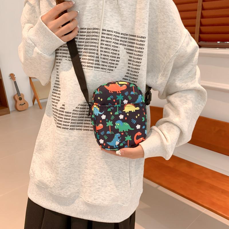 New dinosaur printed messenger mobile phone bag cartoon cute storage small bag casual out color shoulder messenger bag